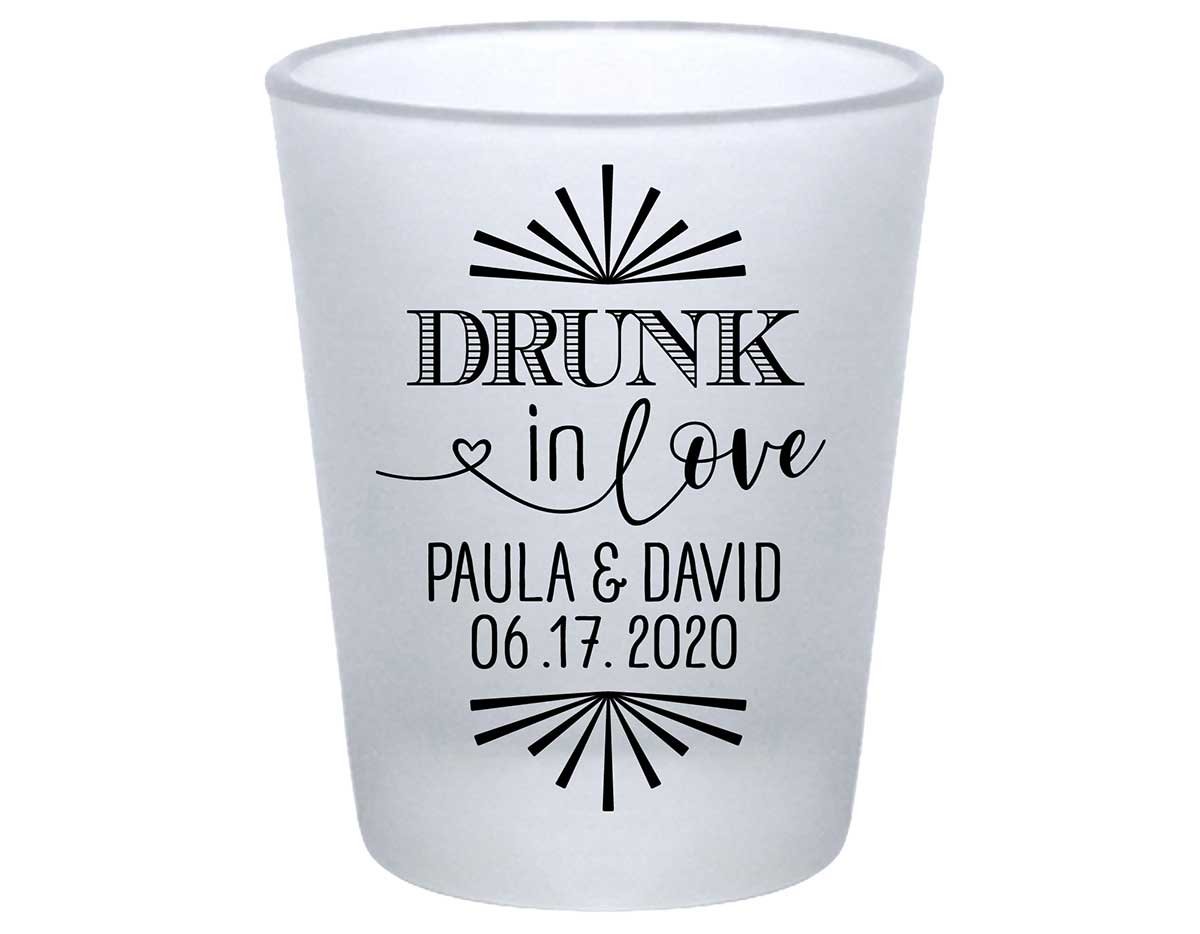 https://www.thatweddingshop.com/wp-content/uploads/2020/02/Drunk-In-Love-1C-Standard-Frosted-1.75oz-Shot-Glasses-Funny-Wedding-Favors.jpg